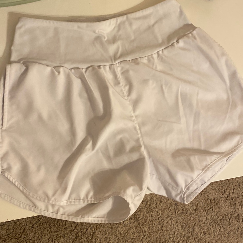 amazon white shorts about 4” inseam size medium